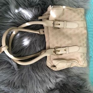 Tan Dooney & Bourke